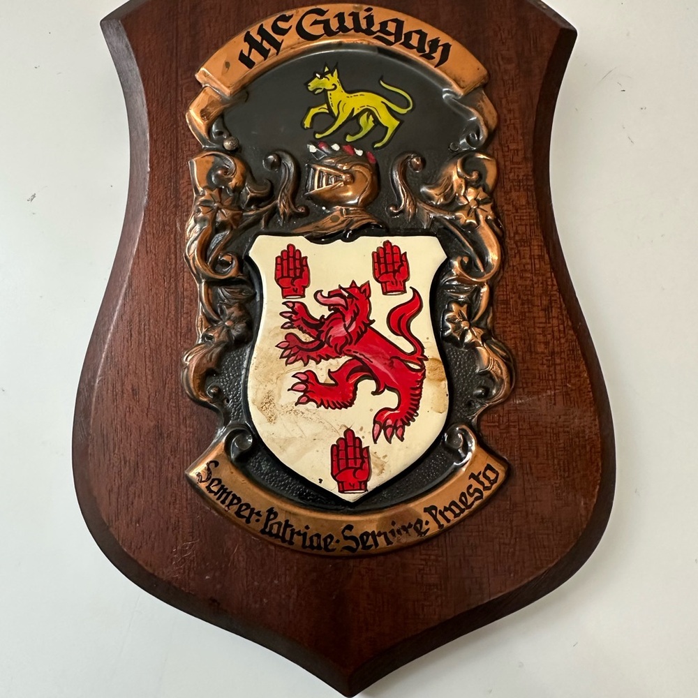 McGuigan family coat of arms and crest Wall Plaque Brown and Red